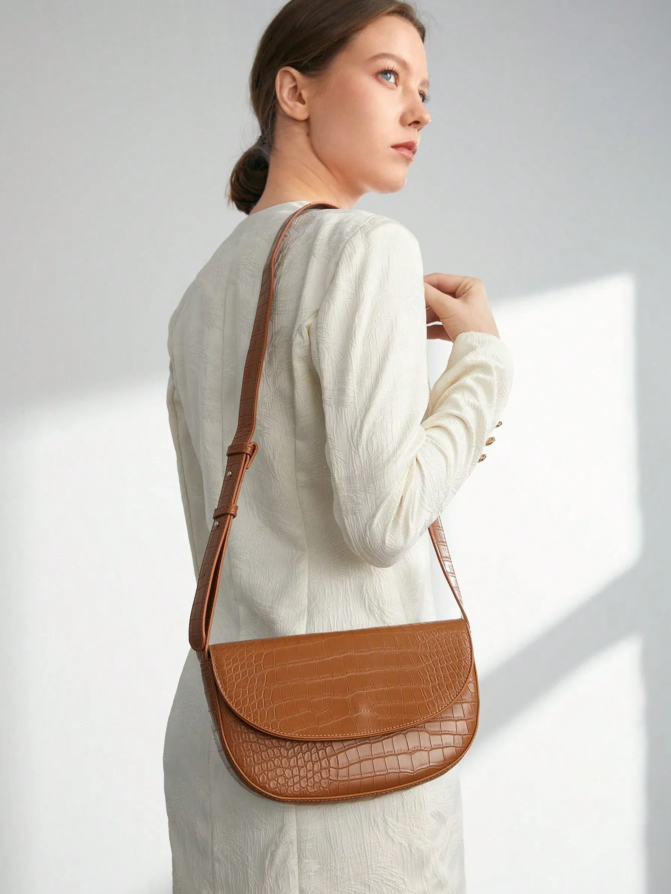 Crocodile Embossed Flap Saddle Bag