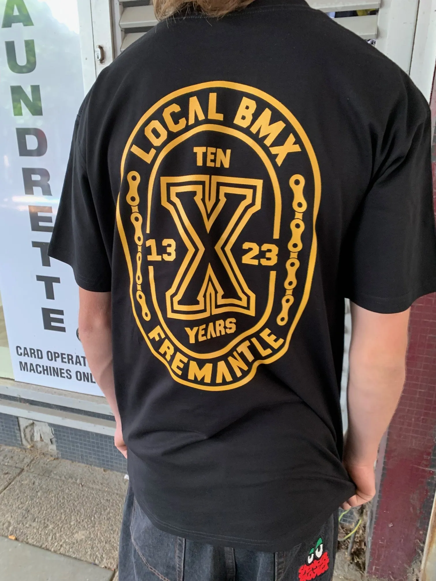 LOCAL TEN YEAR TEE BLACK/GOLD