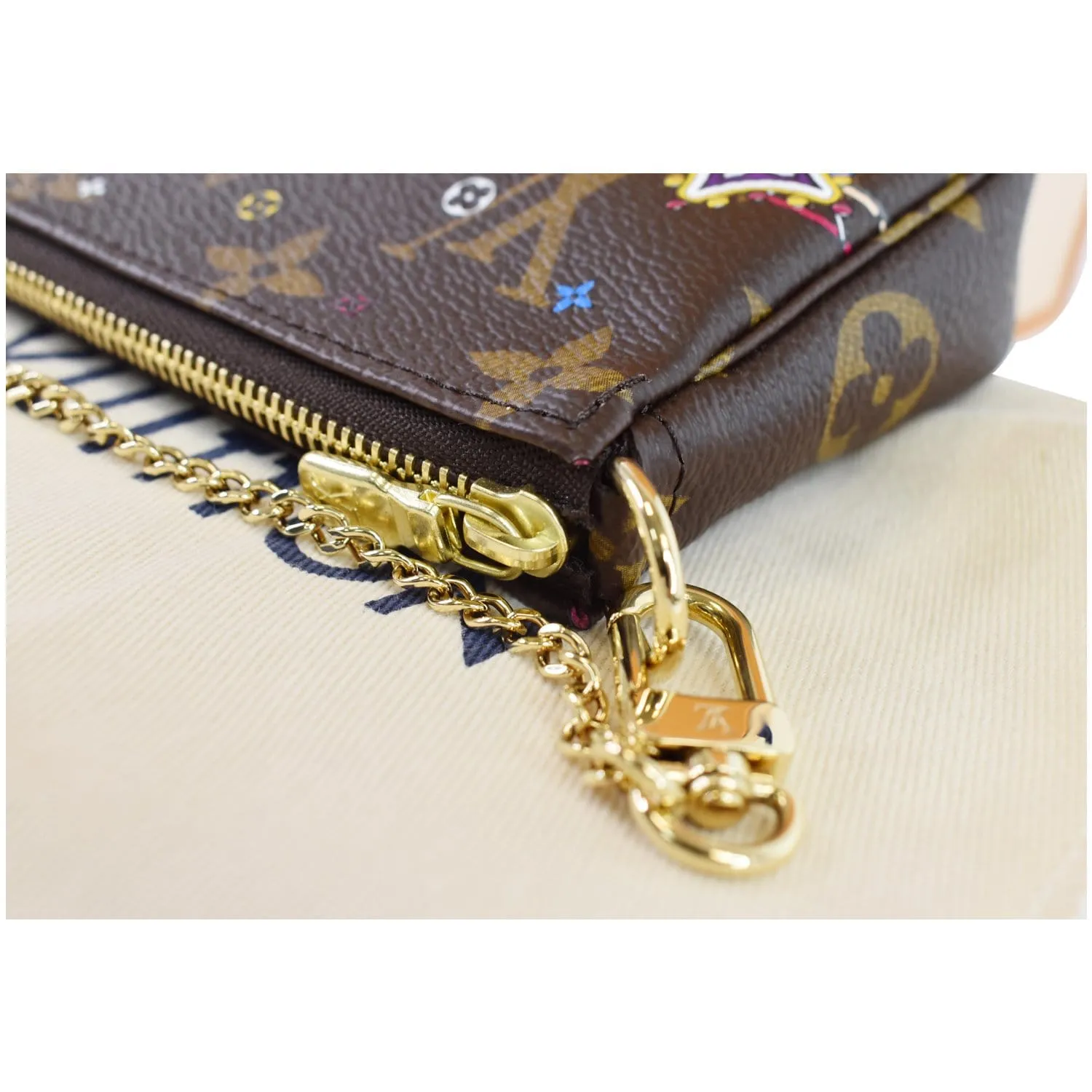 LOUIS VUITTON Mini Pochette Christmas Monogram Canvas Accessoires Pouch Brown