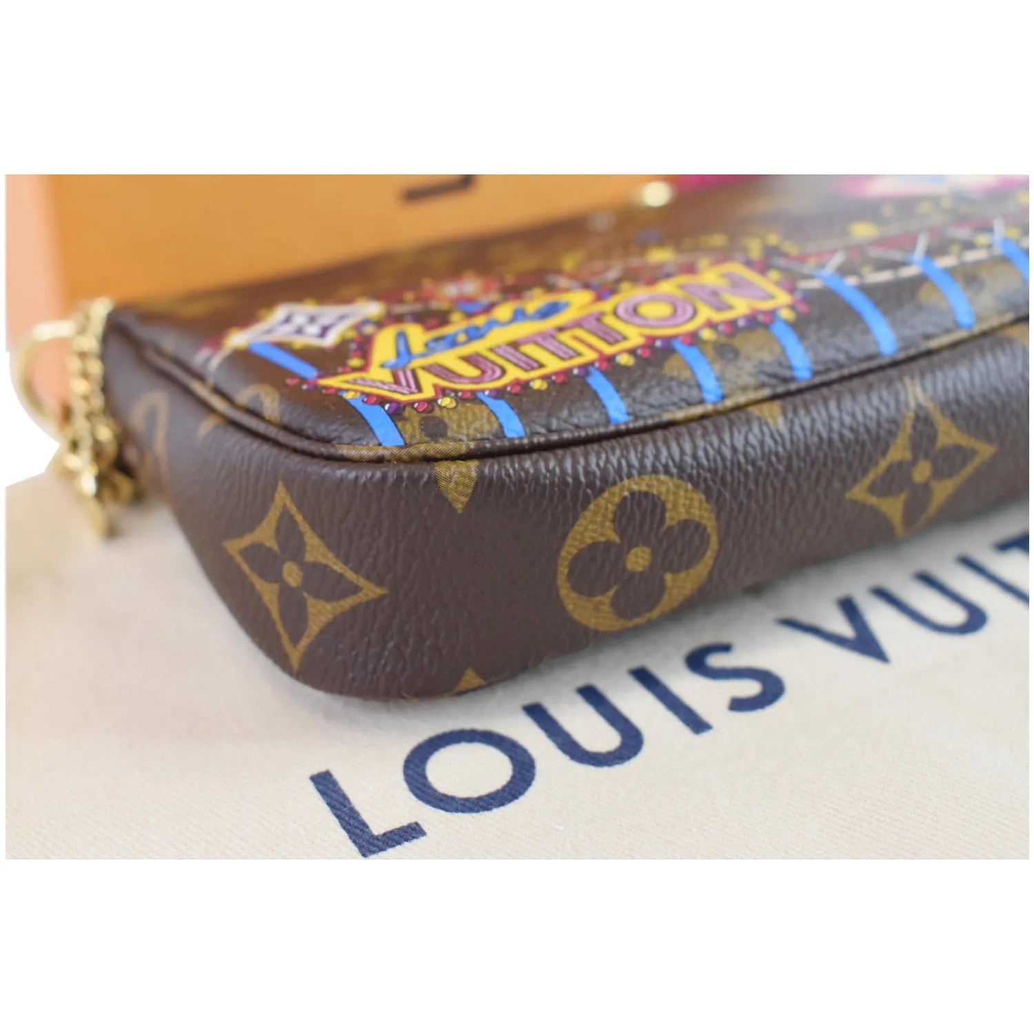 LOUIS VUITTON Mini Pochette Christmas Monogram Canvas Accessoires Pouch Brown