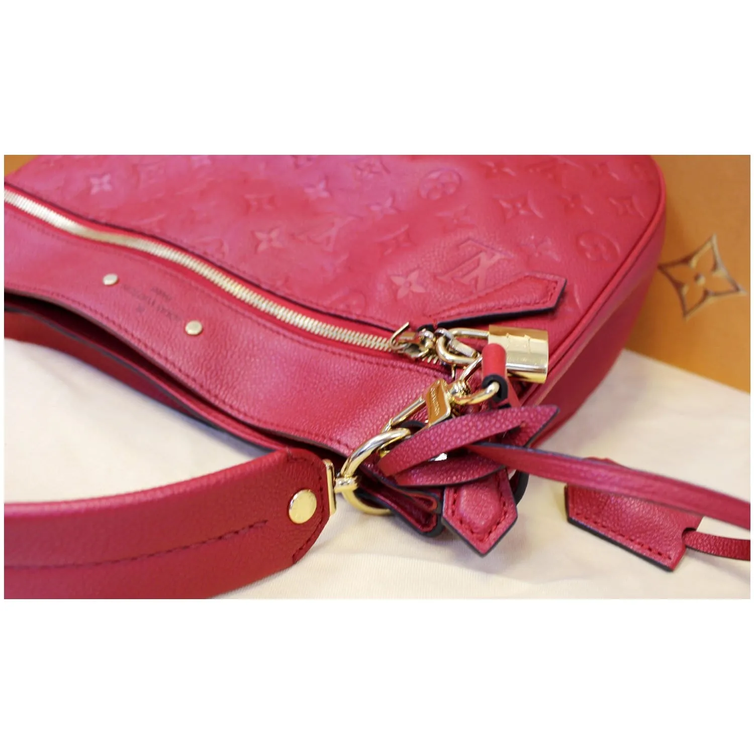 LOUIS VUITTON Spontini Empreinte Leather Shoulder Bag Red