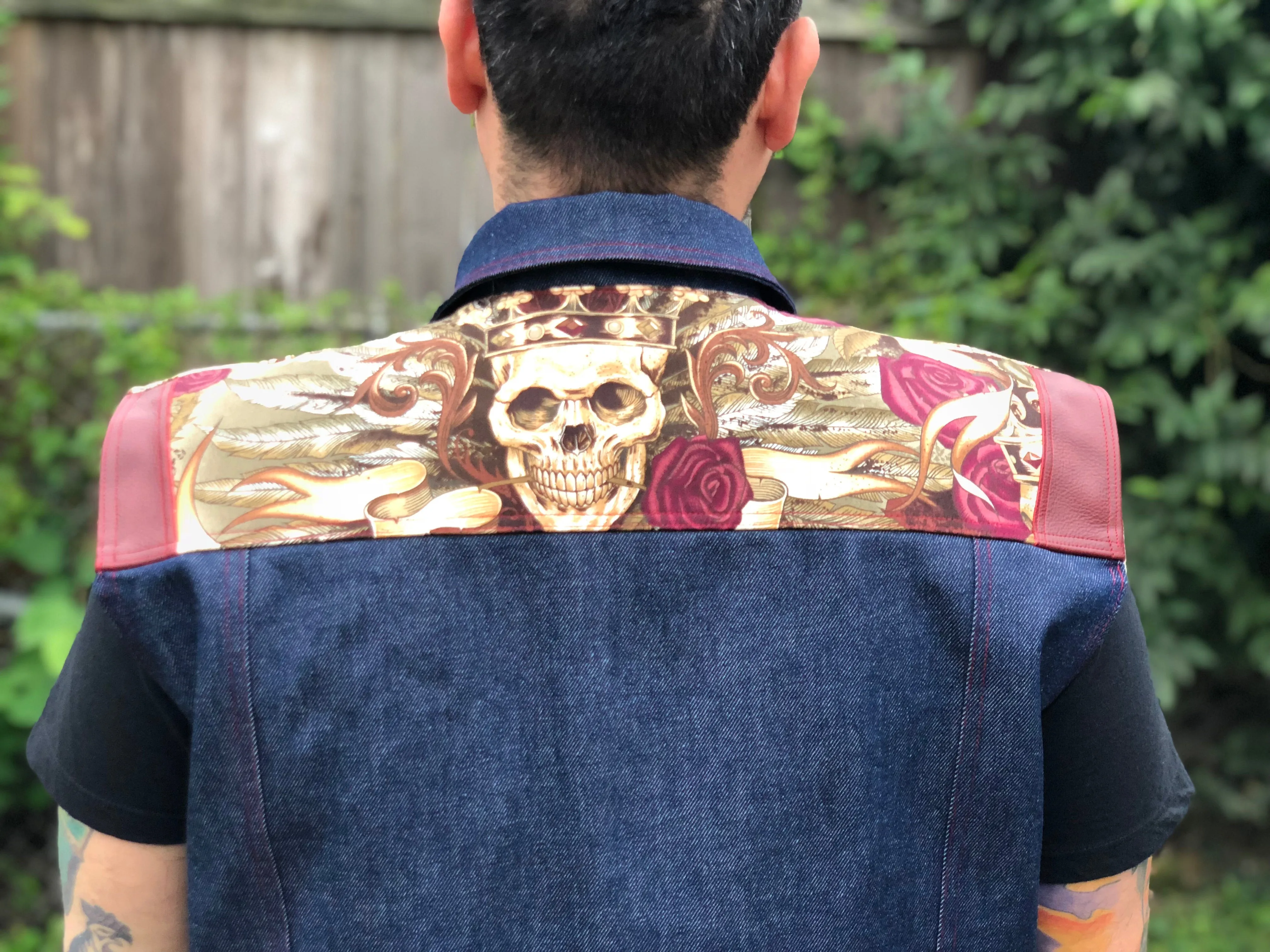 "King I am" denim and leather vest