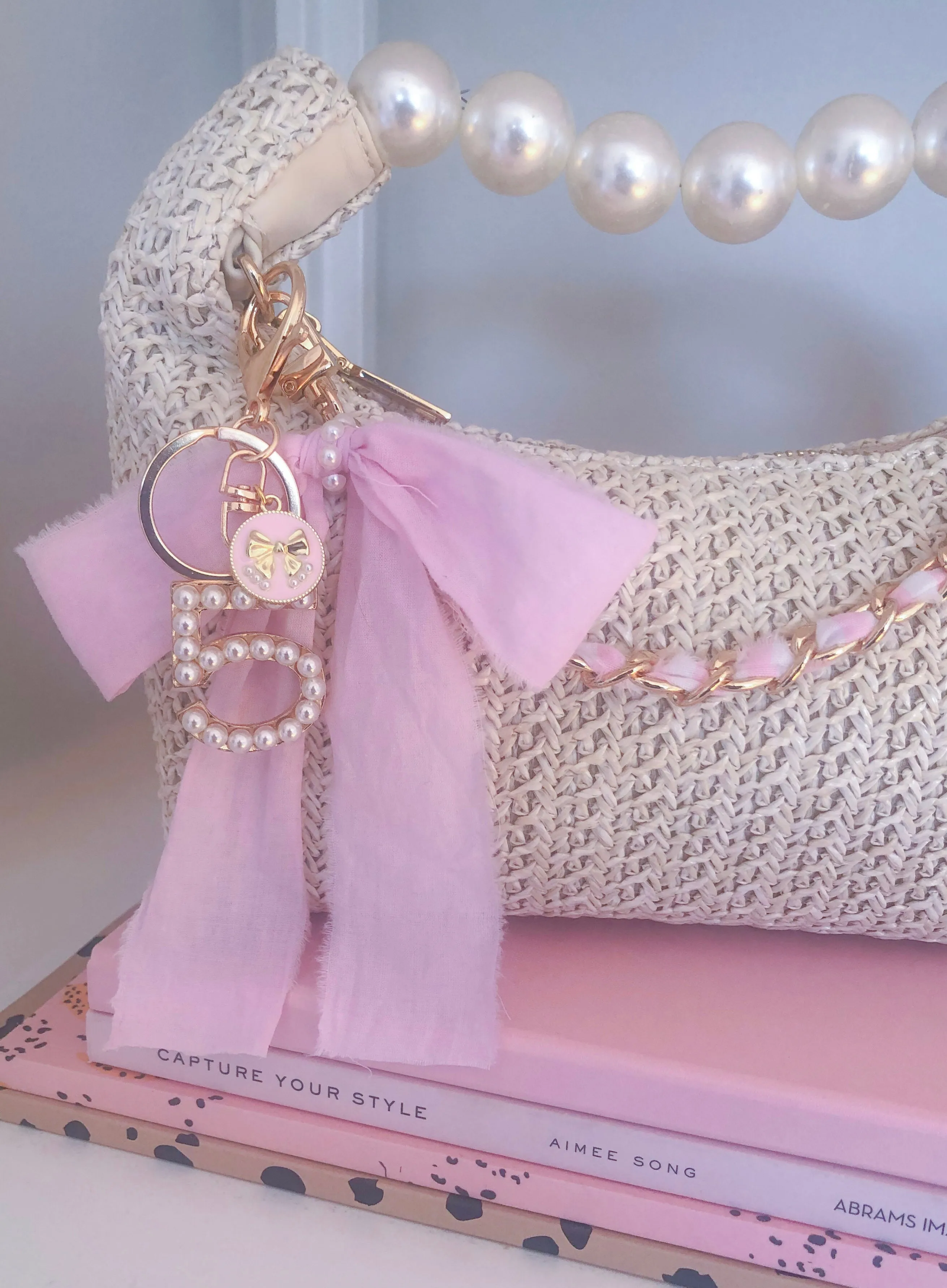 STRAW PEARL BOW BAG