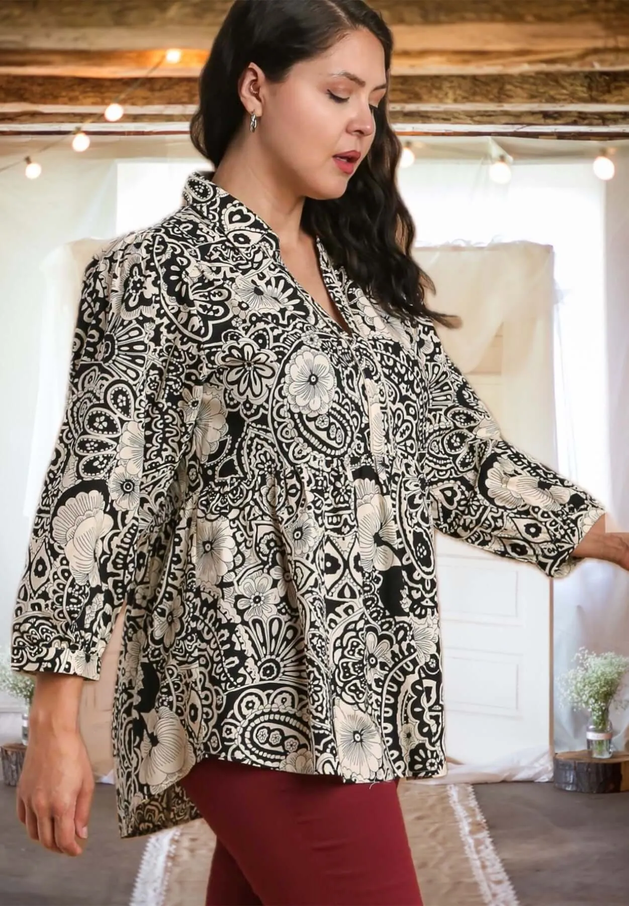This is the Time Mixed Print Babydoll Top in Black/Tan - Curvy